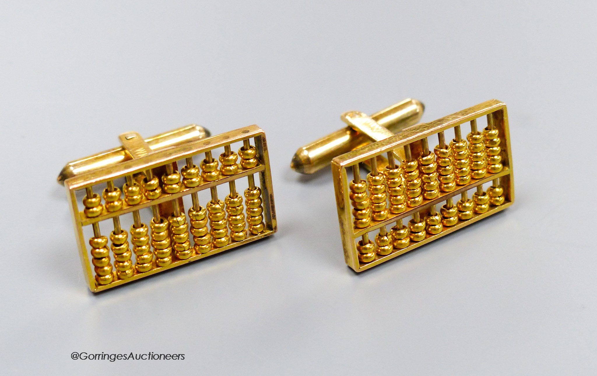 A pair of 14k yellow metal 